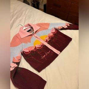 House of sing quality, thick whimsical sweater . Worn one time